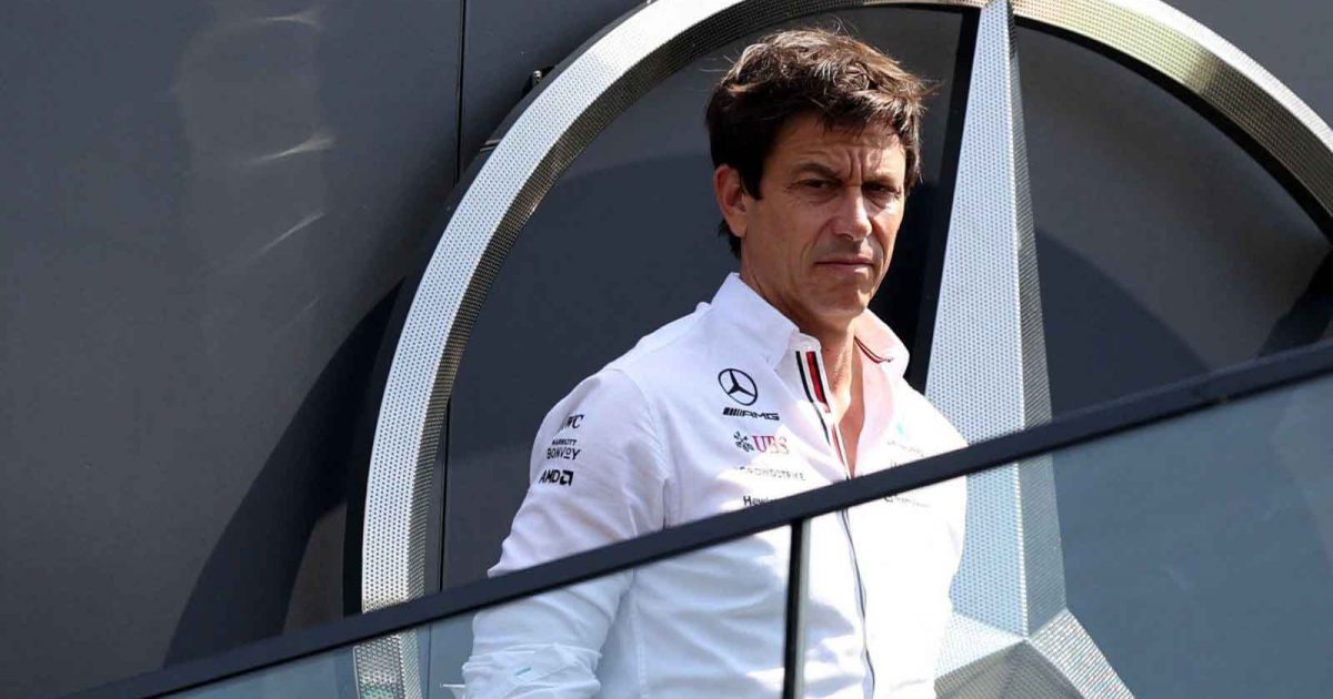 Mercedes team principal Toto Wolff on a balcony. Hungary July 2022.