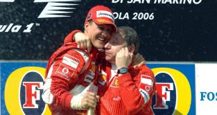 Michael Schumacher hugs Jean Todt. F1 Imola April 2006.