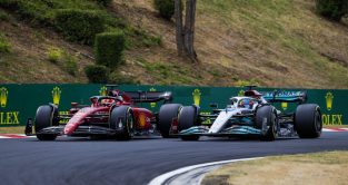 Carlos Sainz's Ferrari alongside George Russell's Mercedes. Hungaroring July 2022.