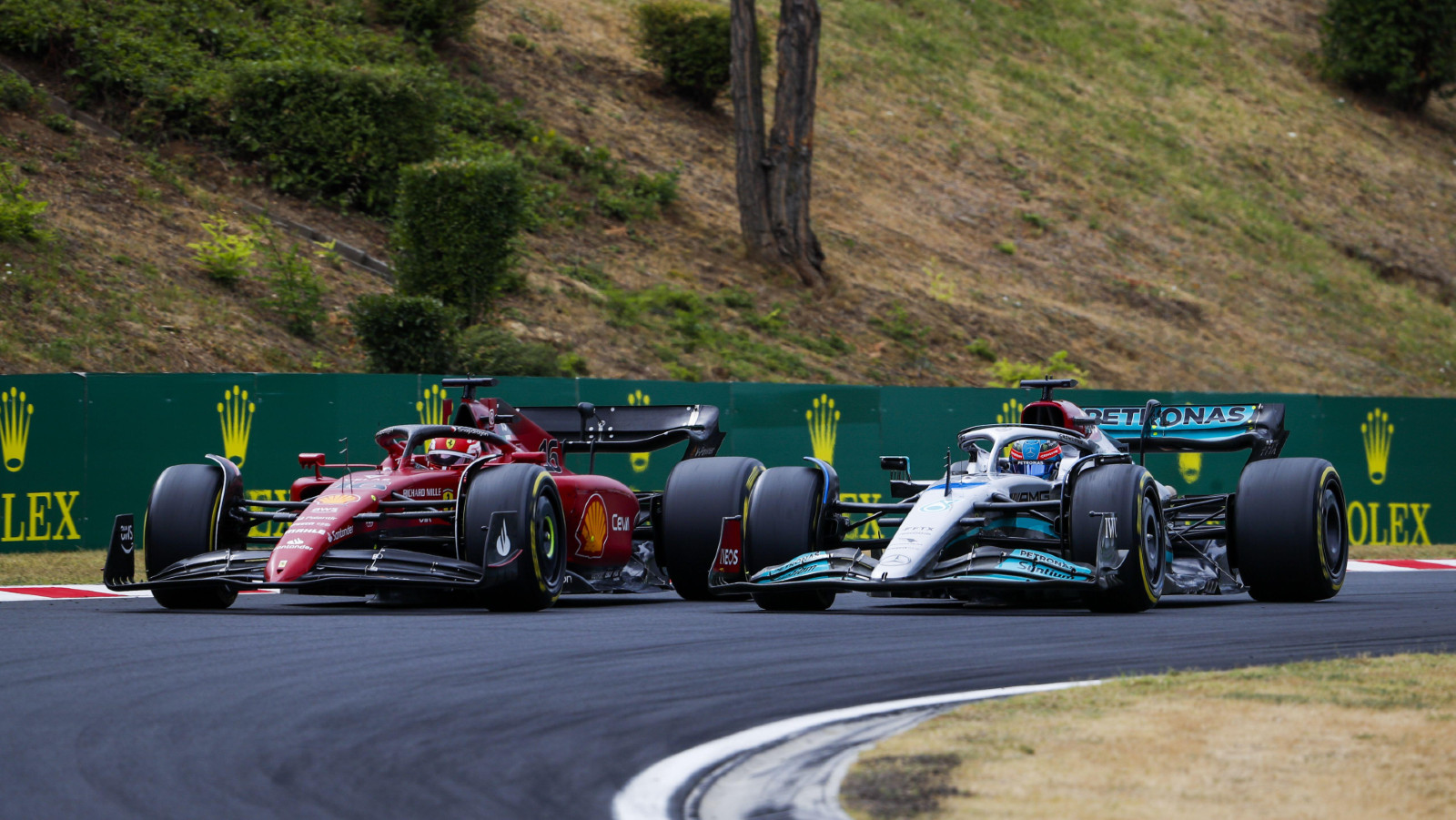 Carlos Sainz's Ferrari alongside George Russell's Mercedes. Hungaroring July 2022.