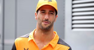 Daniel Ricciardo of McLaren walking through the paddock. Hungary July 2022