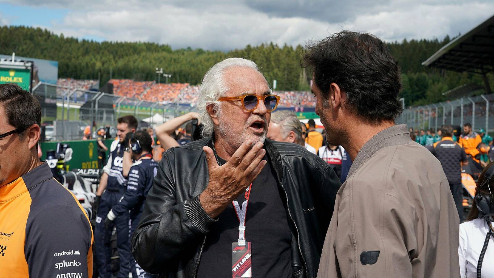 Flavio Briatore talks to Mark Webber. Red Bull Ring July 2022.