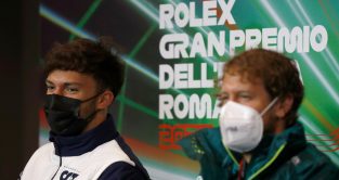 Pierre Gasly, AlphaTauri, and Sebastian Vettel, Aston Martin, in a press conference. Italy, April 2022.