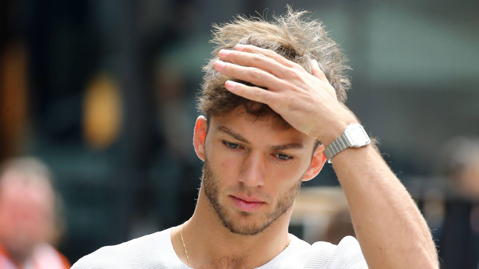 Pierre Gasly put his hand on his head. Hungaroring July 2022.