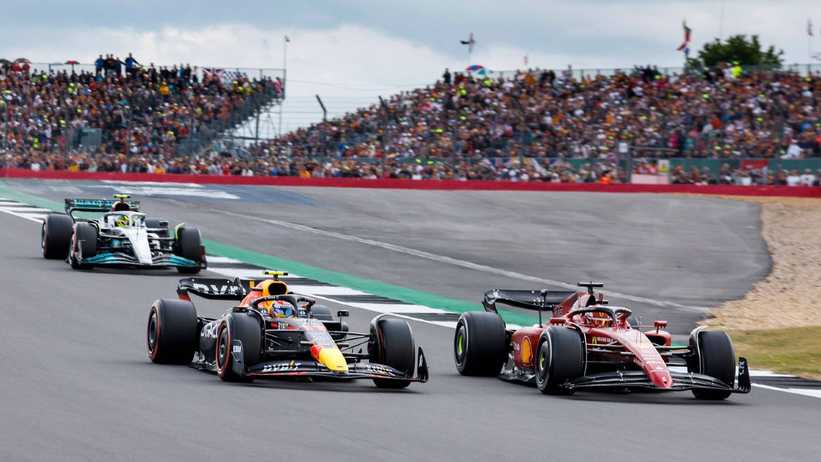 Charles Leclerc's Ferrari and Sergio Perez's Red Bull duel. Silverstone July 2022.