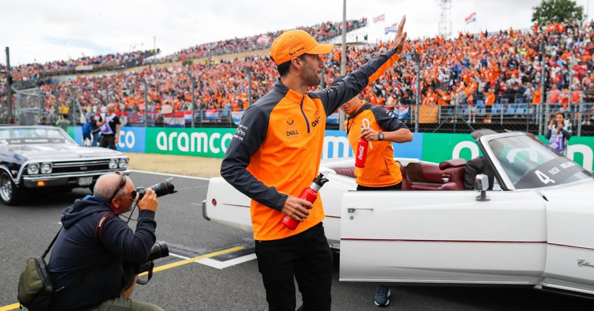 Daniel Ricciardo waves to the crowd. Hungaroring July 2022.