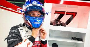 Valtteri Bottas tightening his helmet in the garage, 77. Spain May 2022