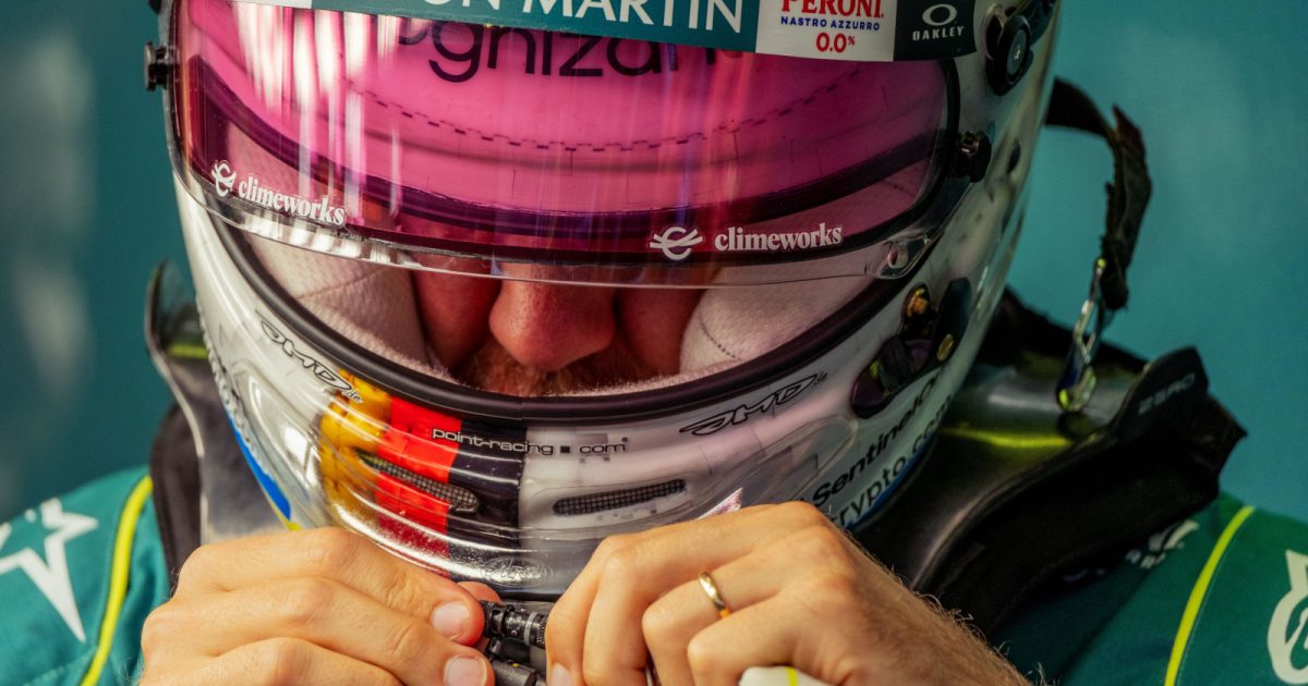 Sebastian Vettel clips in ahead of the grand prix Hungary July 2022