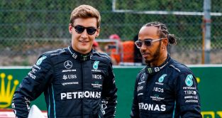 George Russell and Lewis Hamilton smiling and wearing sunglasses. Belgium August 2022