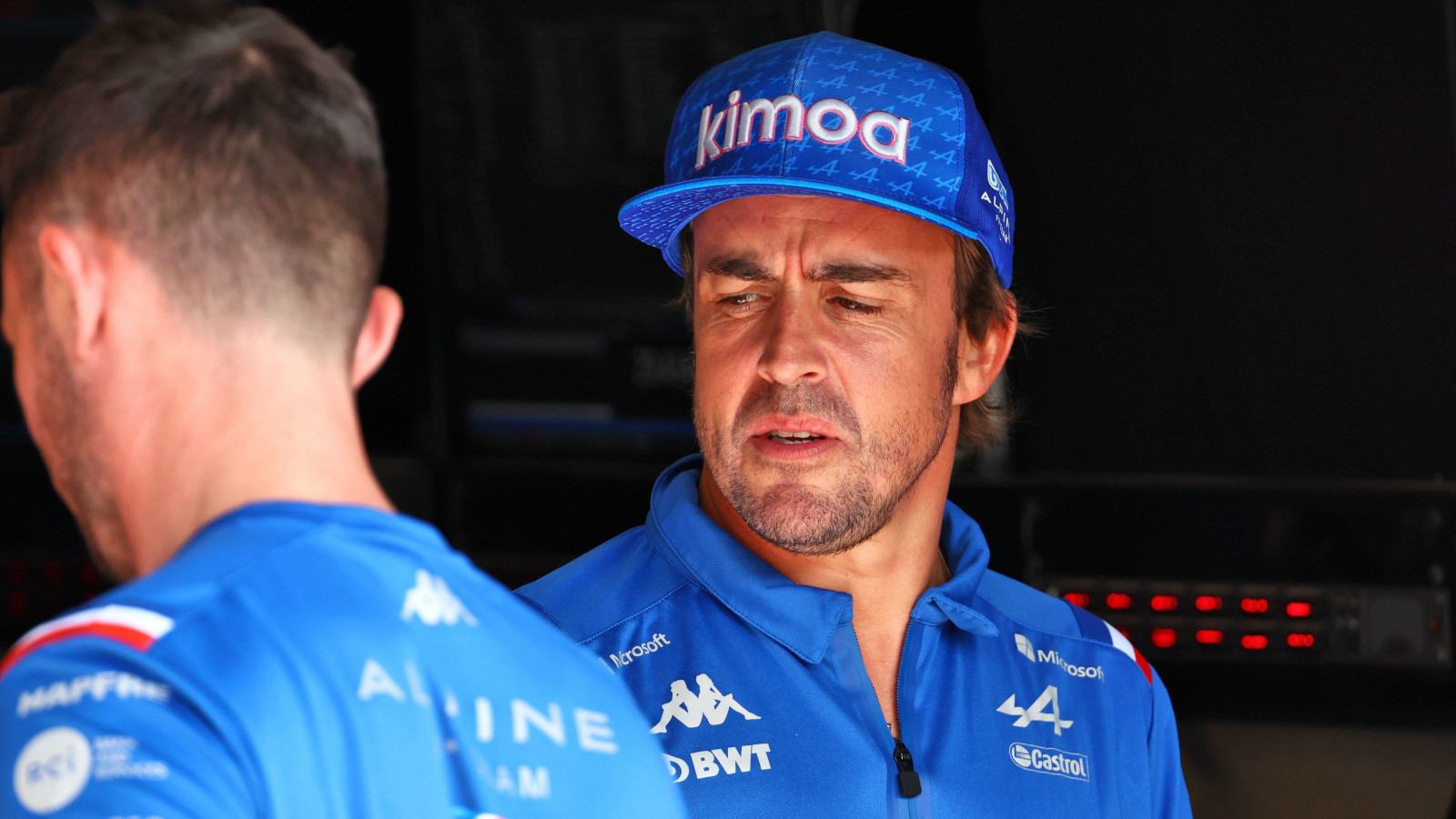 Fernando Alonso with the Alpine team, not looking happy. Belgium August 2022