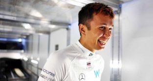Alex Albon walks into Williams garage. Spa August 2022.