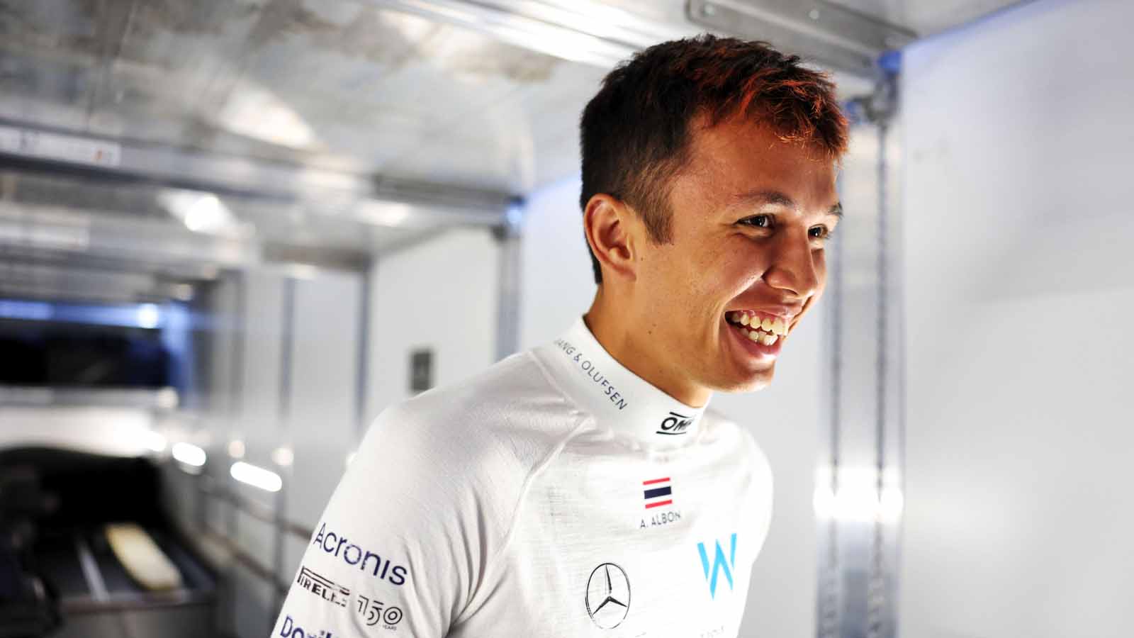 Alex Albon walks into Williams garage. Spa August 2022.