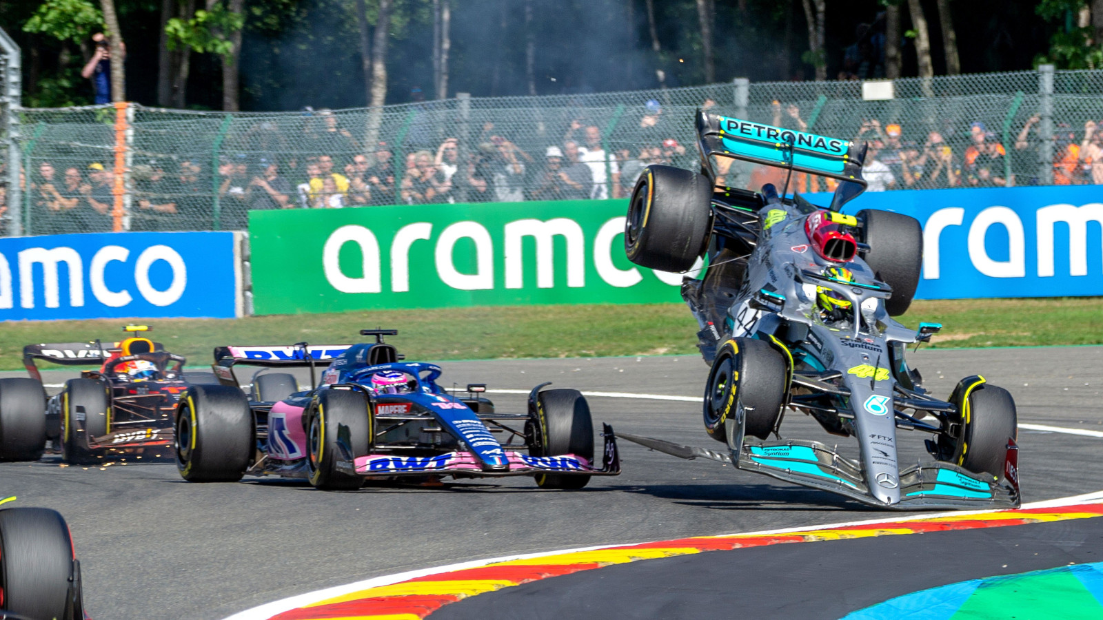 Lewis Hamilton goes airborne after colliding with Fernando Alonso. Belgium August 2022