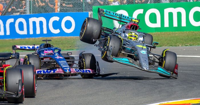 Lewis Hamilton is sent flying after hitting Fernando Alonso on the opening lap. Belgium August 2022