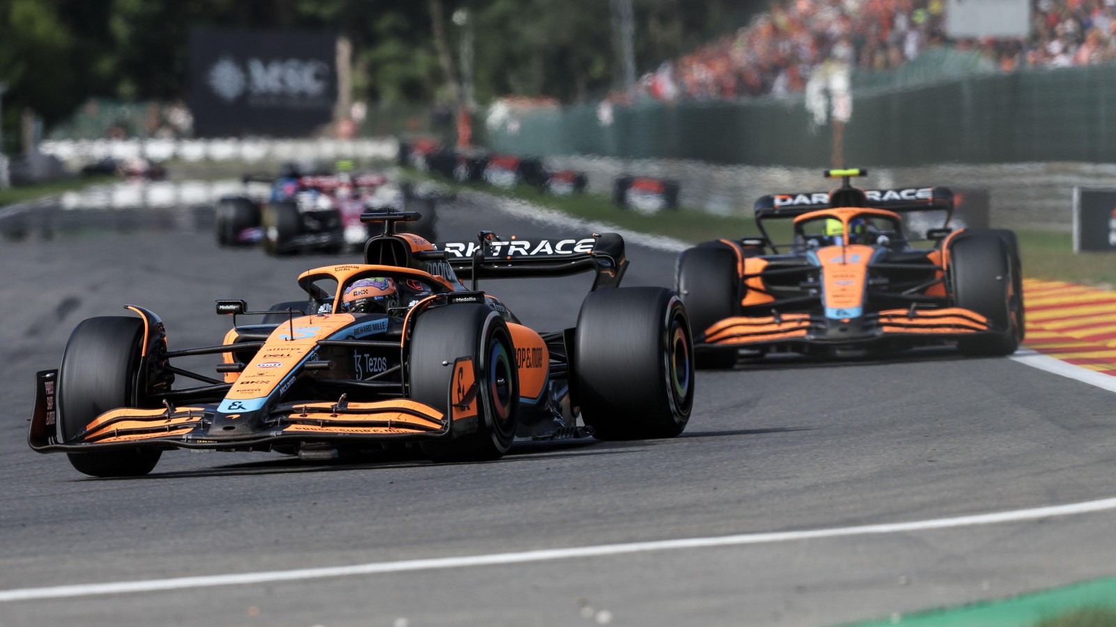 Daniel Ricciardo ahead of McLaren team-mate Lando Norris. Belgium, August 2022.