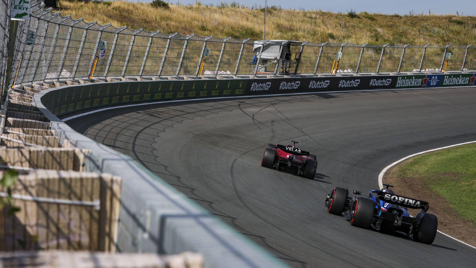 Charles Leclerc's Ferrari goes around the banking in Dutch GP practice. Zandvoort September 2022.