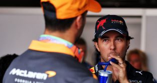 Daniel Ricciardo speaking with Sergio Perez. Netherlands September 2022