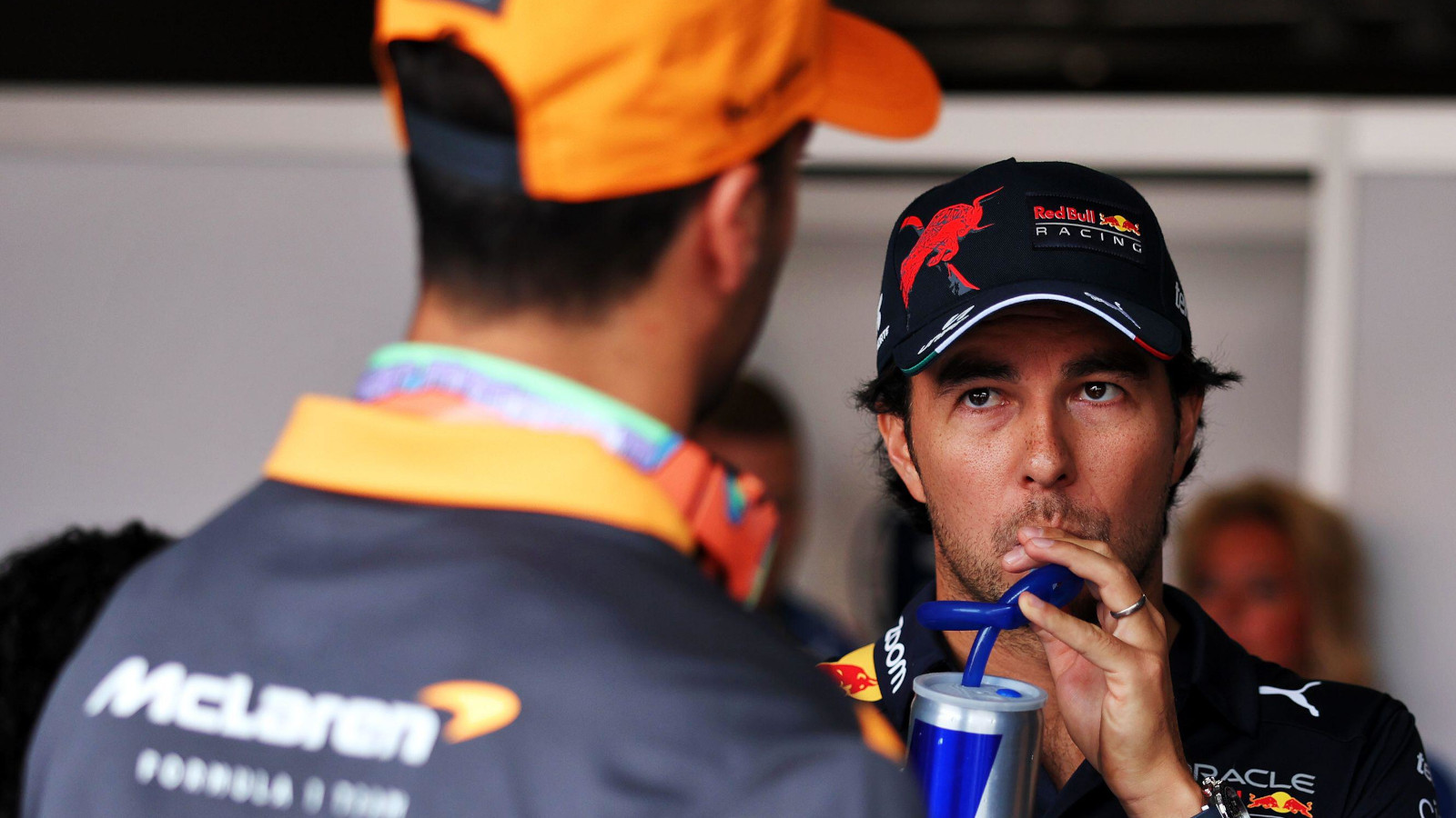 Daniel Ricciardo speaking with Sergio Perez. Netherlands September 2022