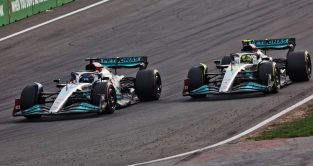 George Russell gets past Mercedes team-mate Lewis Hamilton. Zandvoort September 2022.