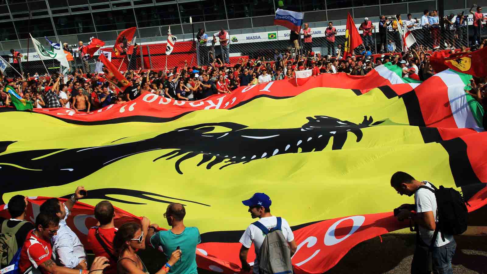 Tifosi with a Ferrari flag. Italian GP Monza F1 quiz September 2012.