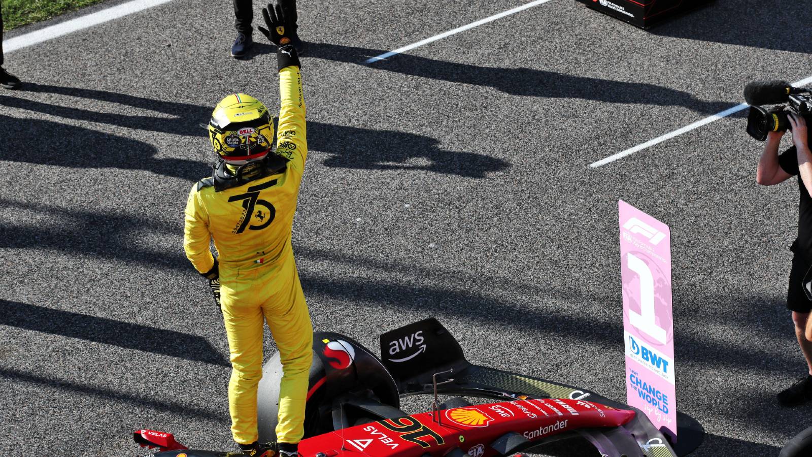 Scuderia Ferrari  The moment Charles Leclerc & Carlos Sainz revealed their  new 2024 helmets to each other : r/formula1