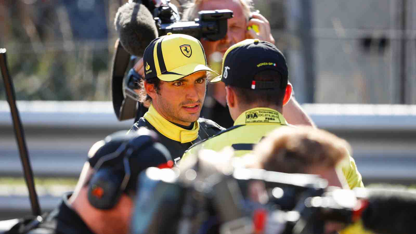 Carlos Sainz with Charles Leclerc. Monza September 2022.