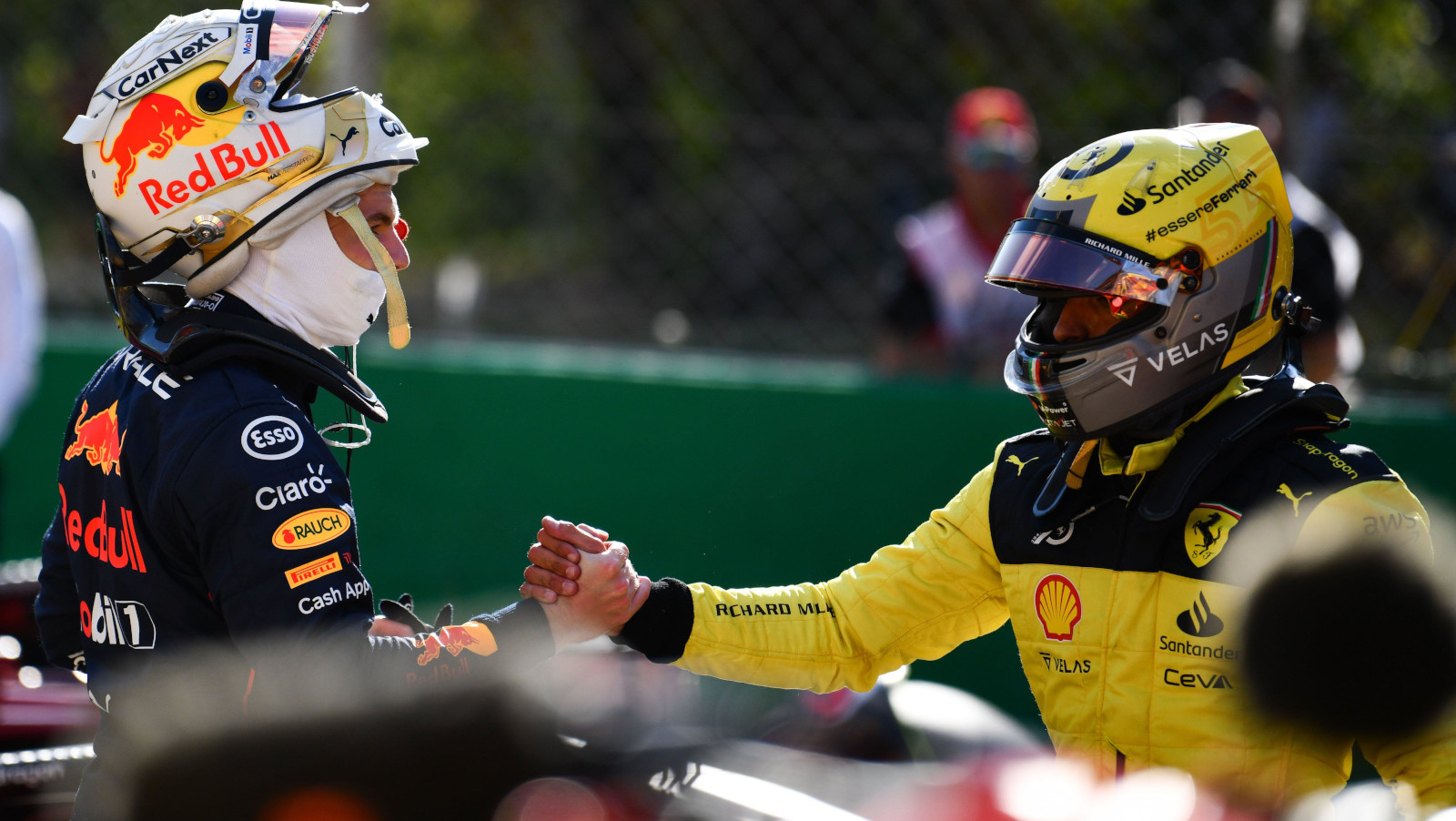 Max Verstappen shakes hands with Charles Leclerc. Italy September 2022
