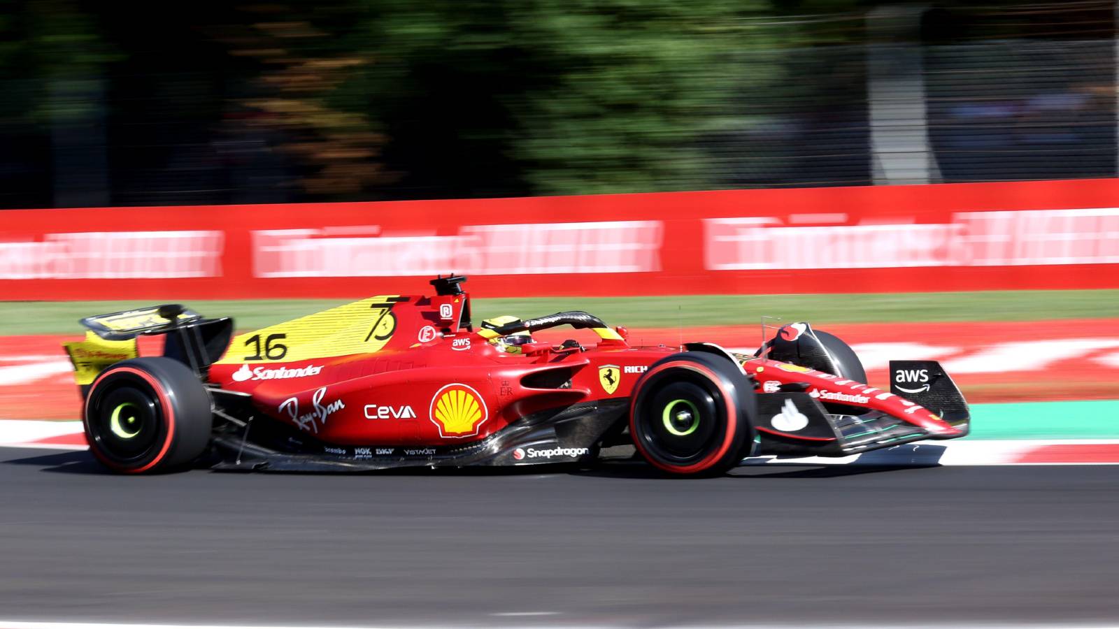 Charles Leclerc in yellow liveried Ferrari. Monza September 2022.