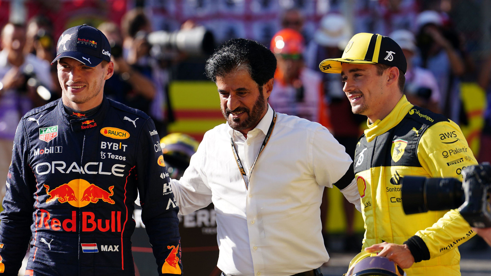 Max Verstappen and Charles Leclerc walking with Mohammed Ben Sulayem. Italy September 2022