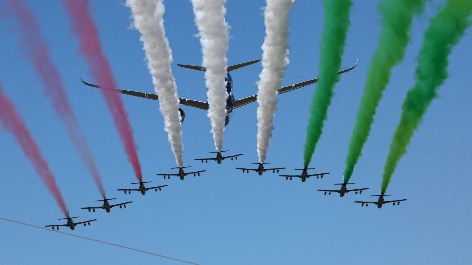 A flypast at Monza including a military plane and nine jets. Italy September 2022