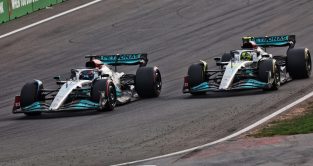 Mercedes' George Russell passes Lewis Hamilton during the Dutch Grand Prix. Zandvoort, September 2022.
