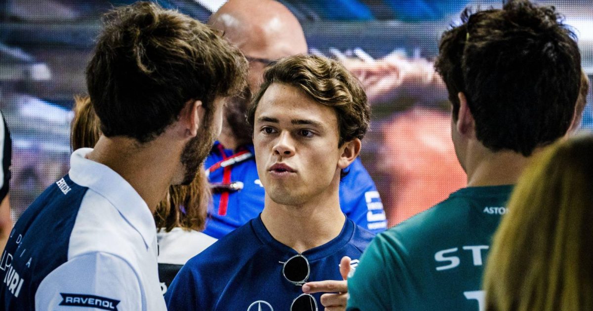 Nyck de Vries talking to Pierre Gasly. Monza September 2022.