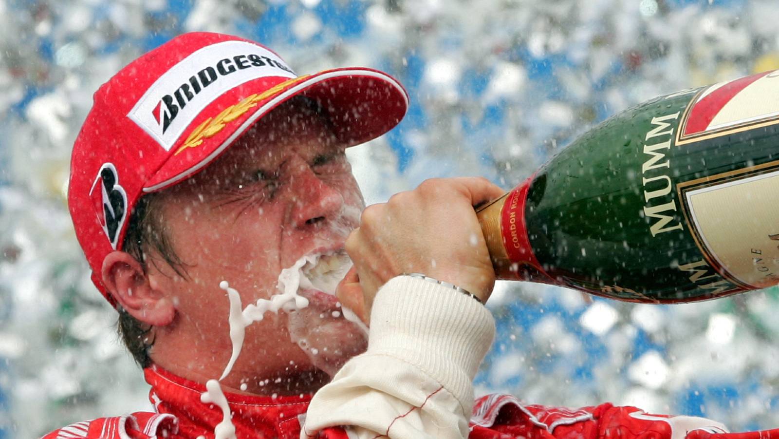 Kimi Raikkonen drinking champagne on the podium. Interlagos October 2007.