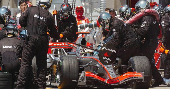 Kimi Raikkonen's McLaren being refuelled at a pit-stop. Montreal June 2006.