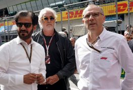 Flavio Briatore between FIA president Mohammed ben Sulayem and Stefano Domenicali. Red Bull Ring July 2022.