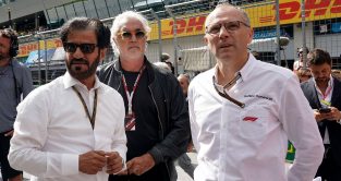 Flavio Briatore between FIA president Mohammed ben Sulayem and Stefano Domenicali. Red Bull Ring July 2022.