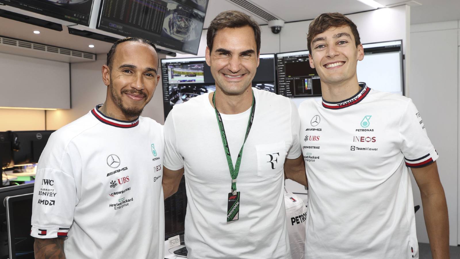 Roger Federer poses with Lewis Hamilton and George Russell. Barcelona May 2022.