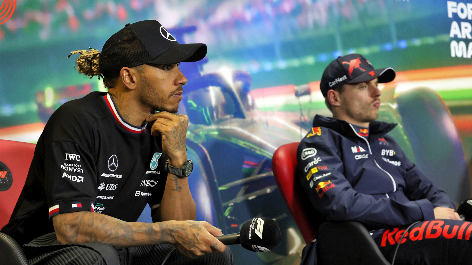 Lewis Hamilton and Max Verstappen in a press conference. Hungary July 2022