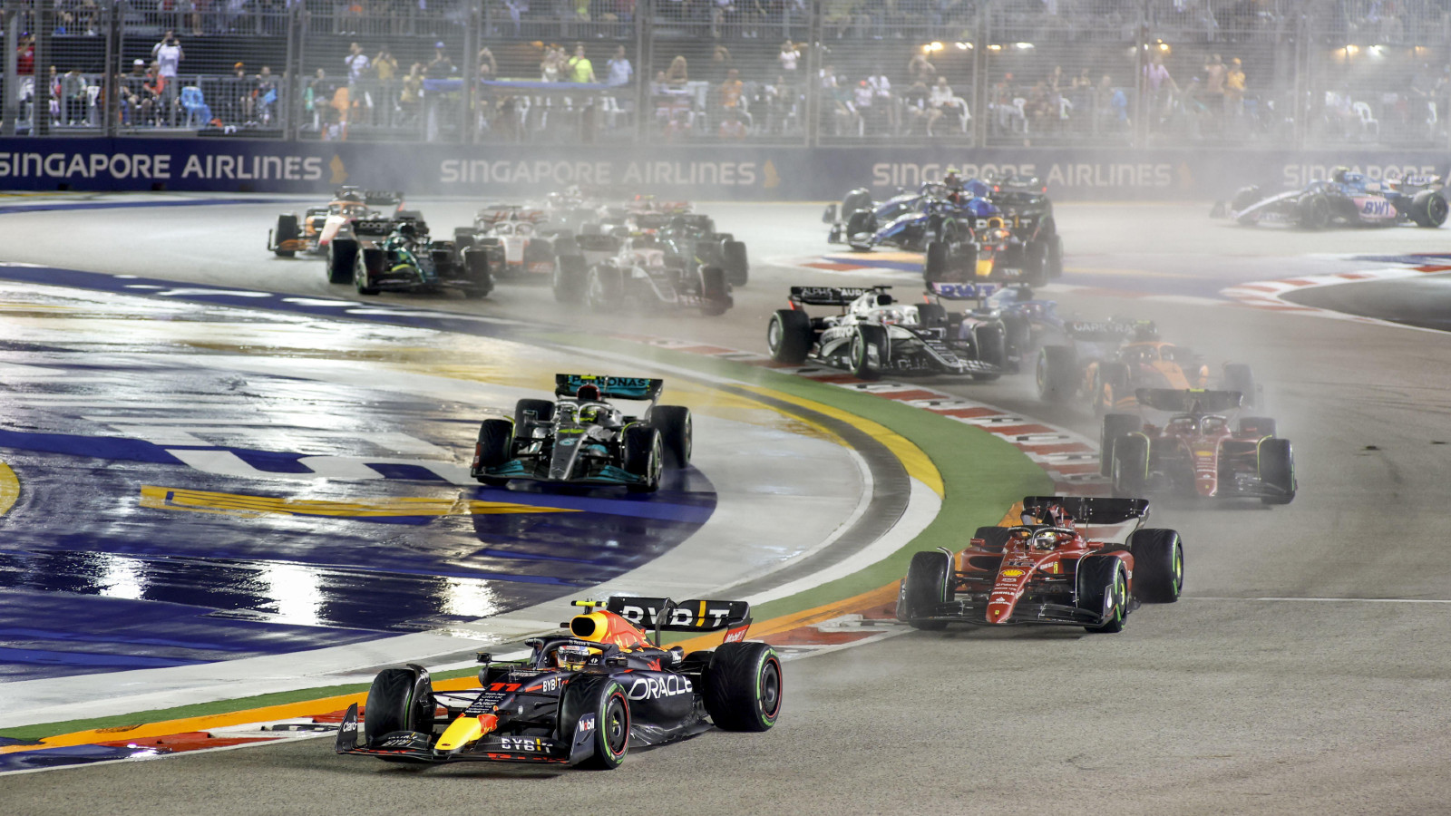 Red Bull's Sergio Perez leads the pack at the Singapore Grand Prix. Marina Bay, October 2022. Budget cap