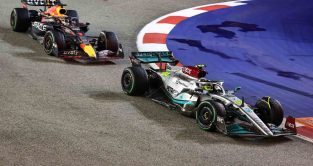 Max Verstappen follows Lewis Hamilton. Singapore October 2022.