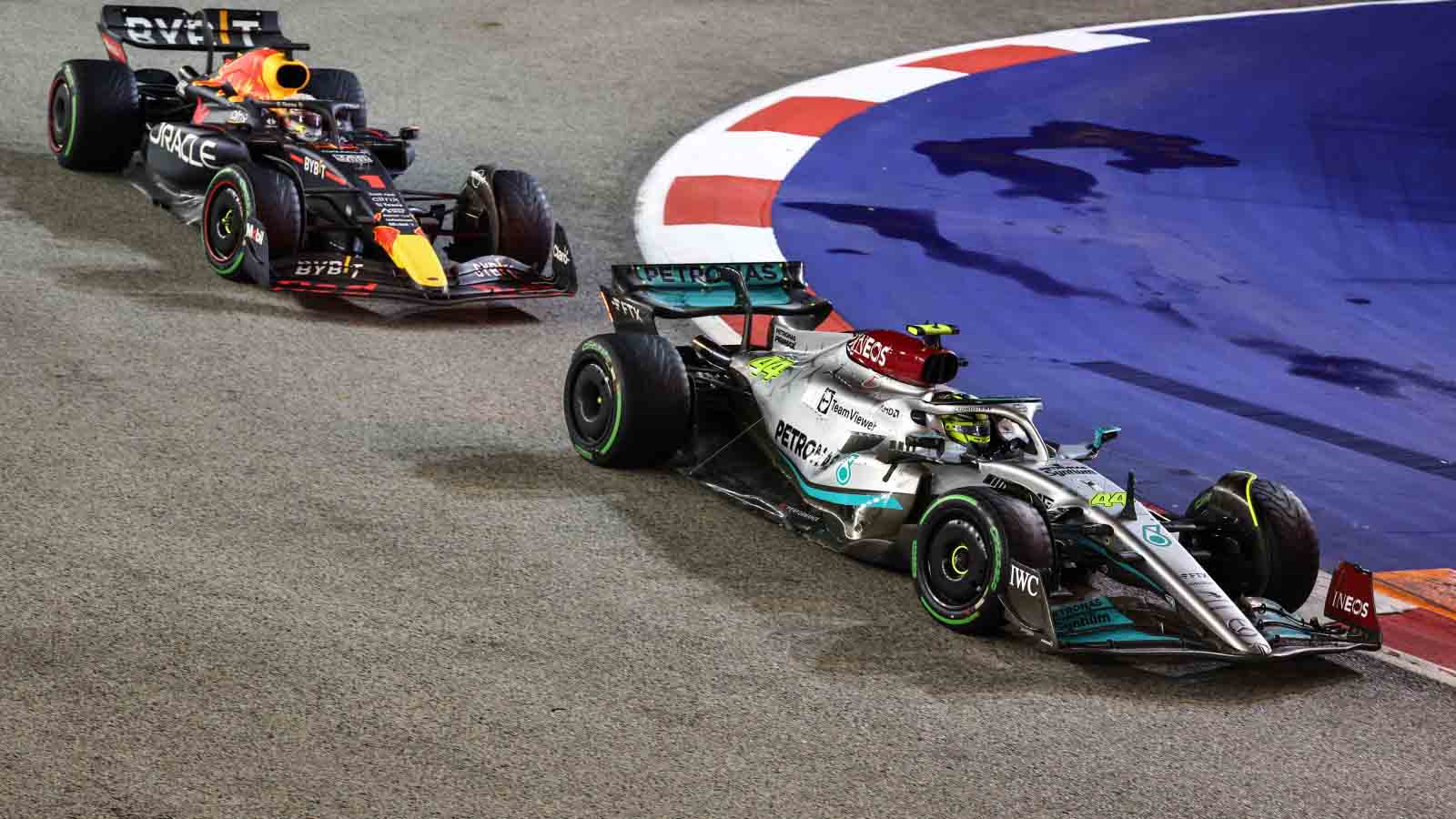 Max Verstappen follows Lewis Hamilton. Singapore October 2022.