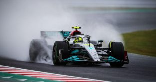Lewis Hamilton drives the Mercedes in the wet. Japan, October 2022.