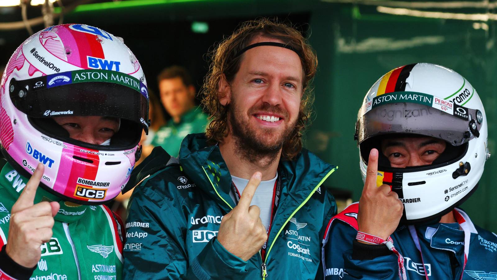 Sebastian Vettel poses with fans at Suzuka. Japan, October 2022.