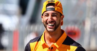 Daniel Ricciardo smiling with his hat backwards. Austin, October 2022.