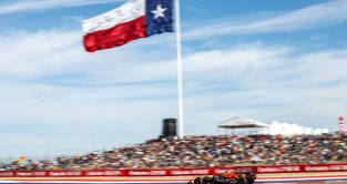 Max Verstappen的红牛在孤星旗前在美国大奖赛。2022年10月奥斯丁。