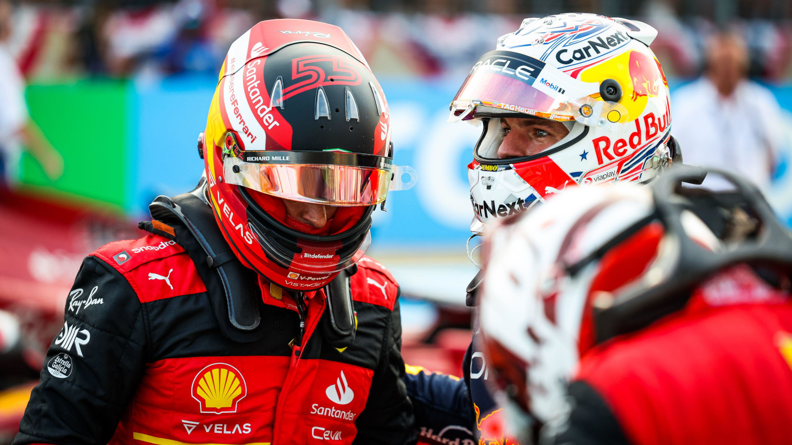 Scuderia Ferrari  The moment Charles Leclerc & Carlos Sainz revealed their  new 2024 helmets to each other : r/formula1