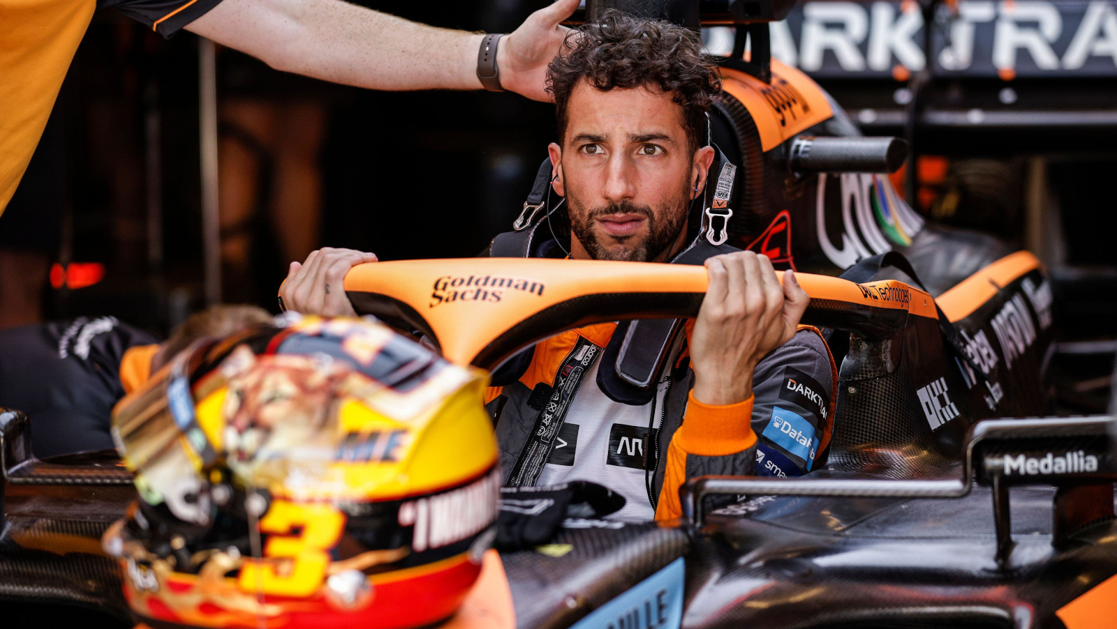 Daniel Ricciardo climbs in his car, serious face. Austin October 2022