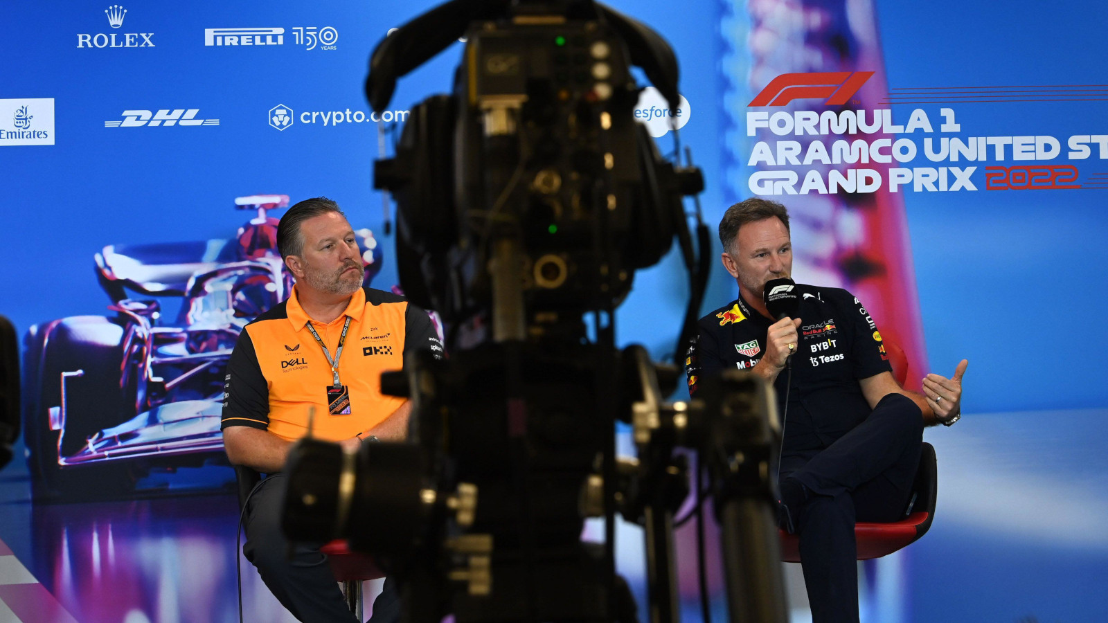 Zak Brown and Christian Horner with the camera dividing them in a press conference. Austin October 2022