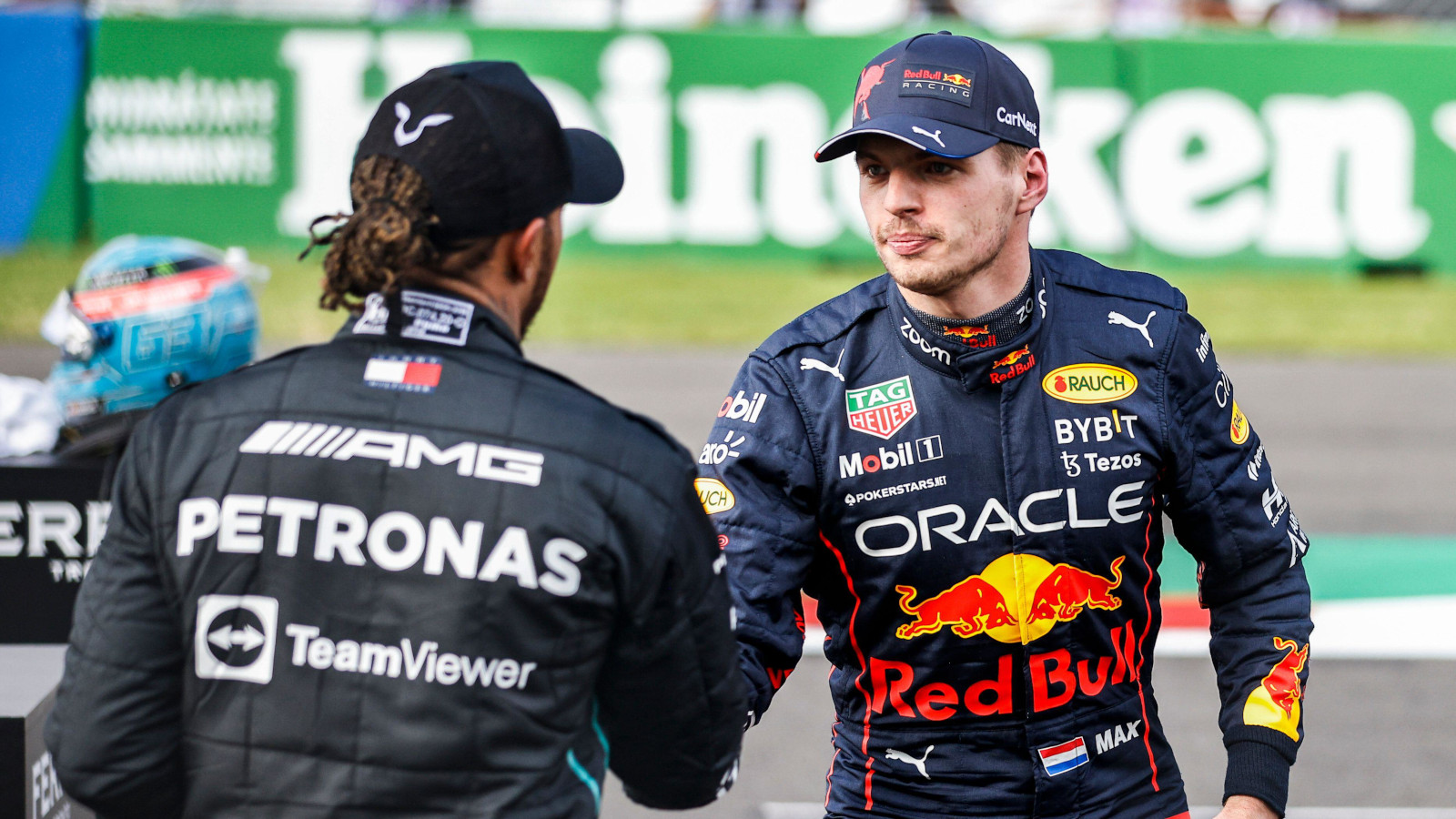Max Verstappen shakes hands with Lewis Hamilton. Mexico October 2022