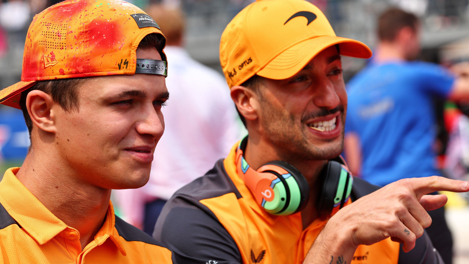 :ando Norris and Daniel Ricciardo laughing on the driver parade. Mexico October 2022